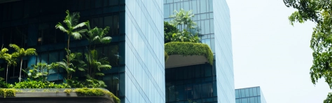 Sustainable city skyscraper building complex with garden balconies, example of eco-urban architecture. 