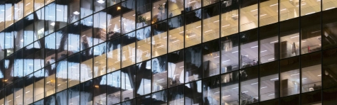 An image of glass office building 