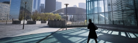 Silhouette of businesswoman walking towards center of business district in Paris, France. City Business Building Exterior Architecture Office Block Exterior Modern People Paris - France Walking France Outdoors City Life Corporate Business Cityscape