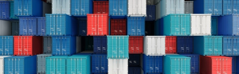 An image of a container box in a shipping port. 