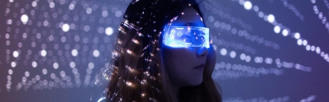 An image of a woman wearing futuristic eyewear. 